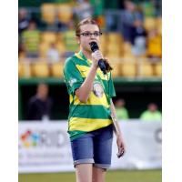 Marissa Peddie singing at a Tampa Bay Rowdies game