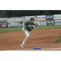 Cole Carder of the Medford Rogues rounds third