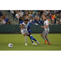 Sacramento Republic FC midfielder Jeremy Hall screens Reno 1868 FC from the ball