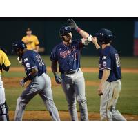 Jayce Boyd of the Somerset Patriots receives a high five