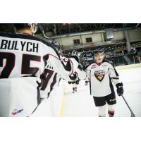 Lukas Svejkovsky of the Vancouver Giants awaits a high five after preseason action vs. the Spokane Chiefs