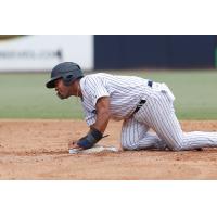 Dom Thompson-Williams of the Tampa Tarpons collects himself after sliding into second