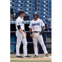 Patrick Osborn (left) and Dom Thompson-Williams of the Tampa Tarpons share a laugh