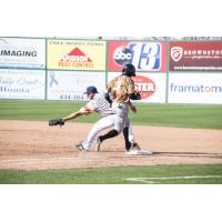 Lynchburg Hillcats first baseman Anthony Miller stretches for the out