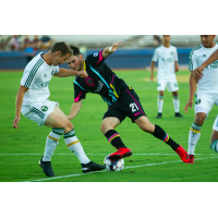 Las Vegas Lights FC's Matt Thomas (21) fights for possession against Portland Timbers 2