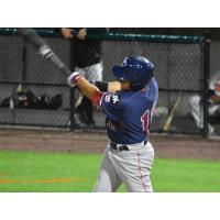 Ramon Flores of the Somerset Patriots swings for the fences