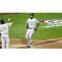 David Washington of the Long Island Ducks scores after another home run