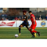 Colorado Springs Switchbacks FC RW Shane Malcolm races upfield vs. Phoenix Rising FC