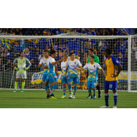 Las Vegas Lights FC' players celebrate a goal by Raul Mendiola (right)