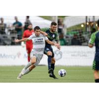 Sacramento Republic FC forward Cameron Iwasa (31) fights for possession vs. OKC Energy FC