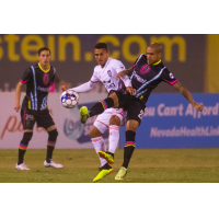 Las Vegas Lights FC's Rafael Garcia (right) fights for possession vs. Orange County SC