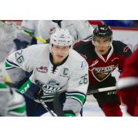 Seattle Thunderbirds forward Nolan Volcan and Vancouver Giants forward Justin Sourdif