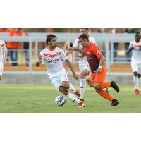 Claudio Munoz of Tulsa Roughnecks FC (left) against the Rio Grande Valley FC Toros