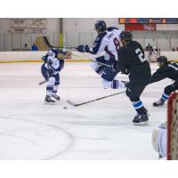 Tulsa Oilers take a shot against the Wichita Thunder