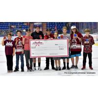 Johnstown Tomahawks present chuck-a-puck check