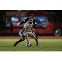 Sacramento Republic FC defender Elliot Hord screens off the opposition