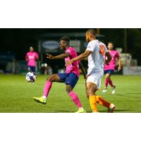 Tulsa Roughnecks FC's Terence Smith (42)battles for possession against Saint Louis FC