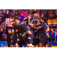 Las Vegas Lights FC celebrates one of its four second half goals in a 5-2 victory over Phoenix Rising FC