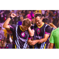 Las Vegas Lights FC's Alex Mendoza (left) and Juan Carlos Garcia celebrate a 5-2 victory over Phoenix Rising FC