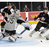 San Antonio Rampage goaltender Ville Husso fights off the Colorado Eagles' attack